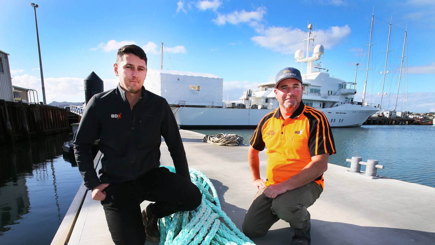 Project manager Scott Davies-Colley and Wharf manager Blair Smeal at the new pontoon with Senses in the background.